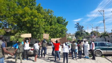 Des militants investissent les rues pour exiger l'application de l'accord d'Ariel Henry 4